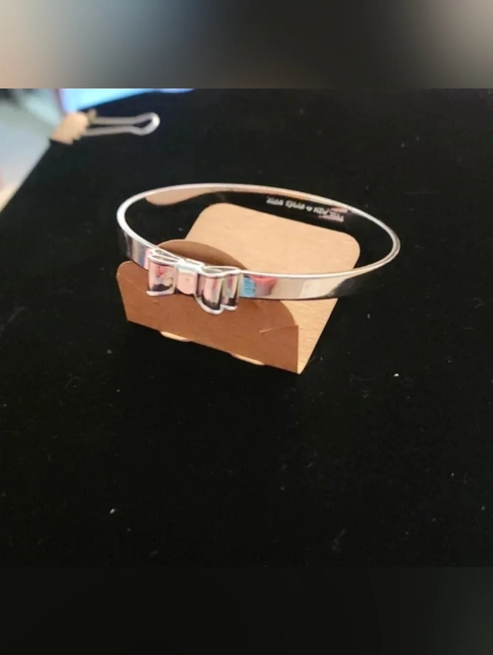 Kate Spade New York 'Take a Bow' Silver Tone Bangle Bracelet 2.5" - Picture 4 of 8